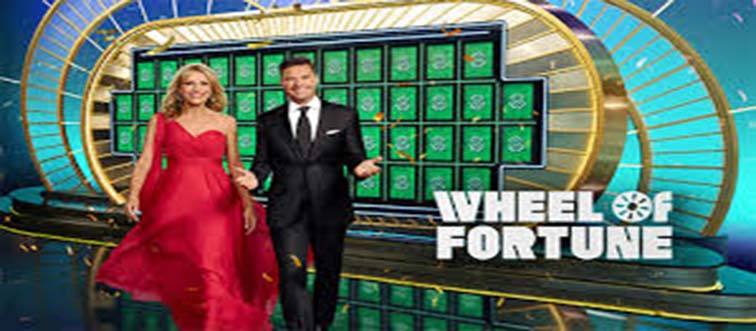 Contestants spin a massive wheel to uncover letters and crack word puzzles in which classic?
