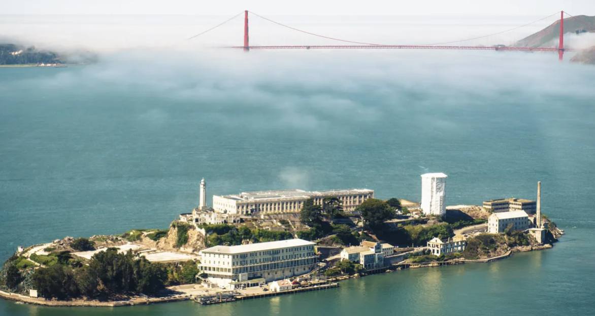 Which high-security island prison dominates the San Francisco Bay?