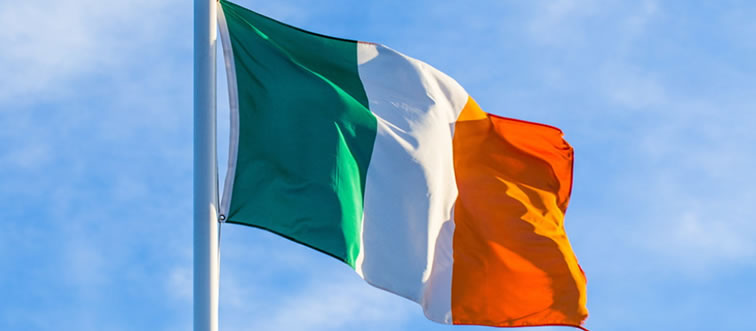 Identify the nation behind these green, white, and orange stripes.